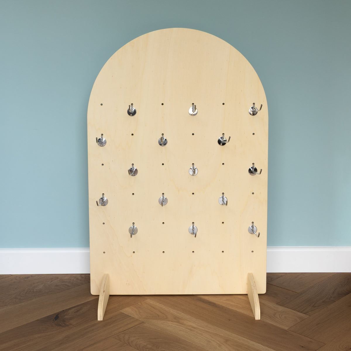 Curved Table Top Pegboard with Retail Hooks