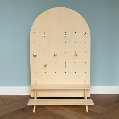 Curved Table Top Pegboard with Tiered Shelving and Retail Hooks