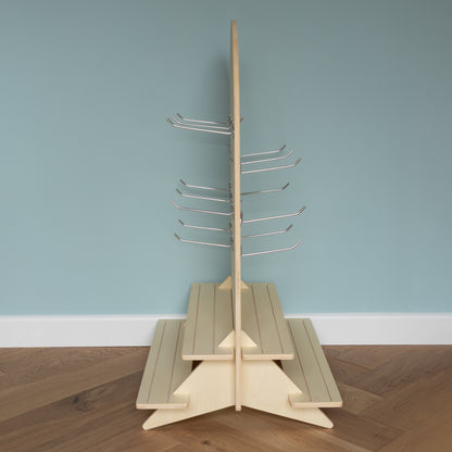 Curved Table Top Pegboard with Tiered Shelving and Retail Hooks