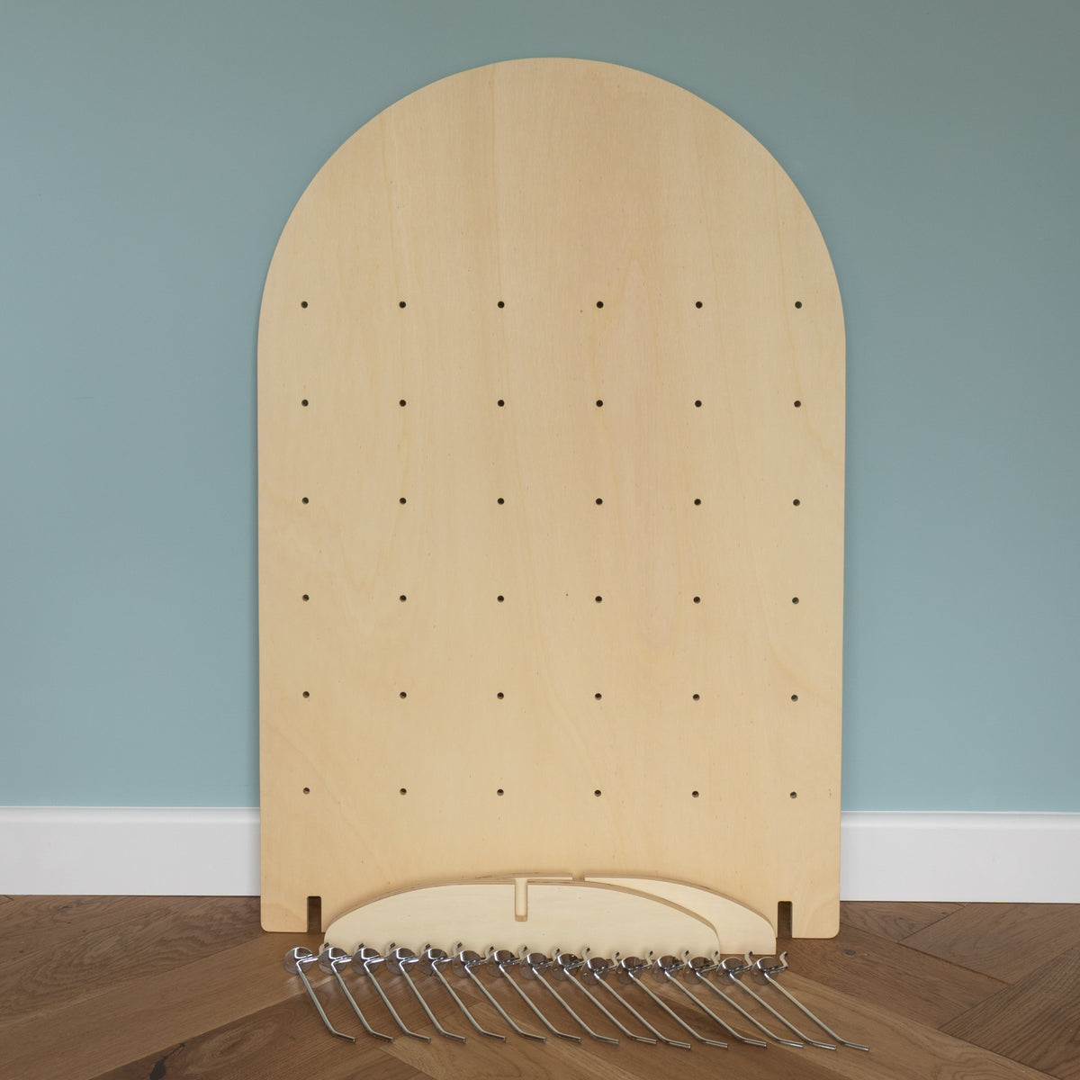 Curved Table Top Pegboard with Retail Hooks